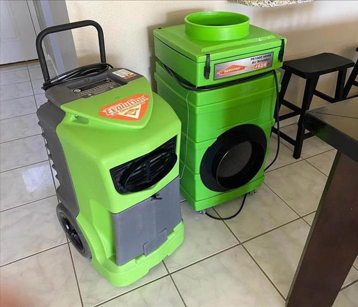 Two large green air movers.