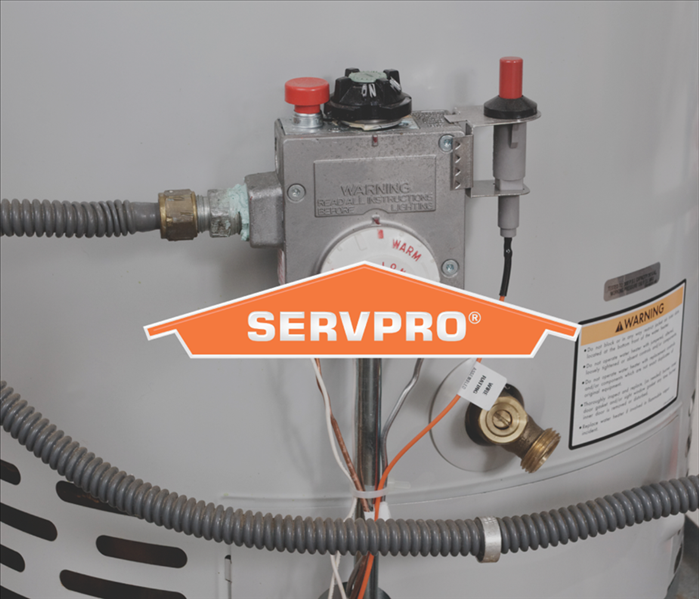 Water heater with a SERVPRO logo on it.