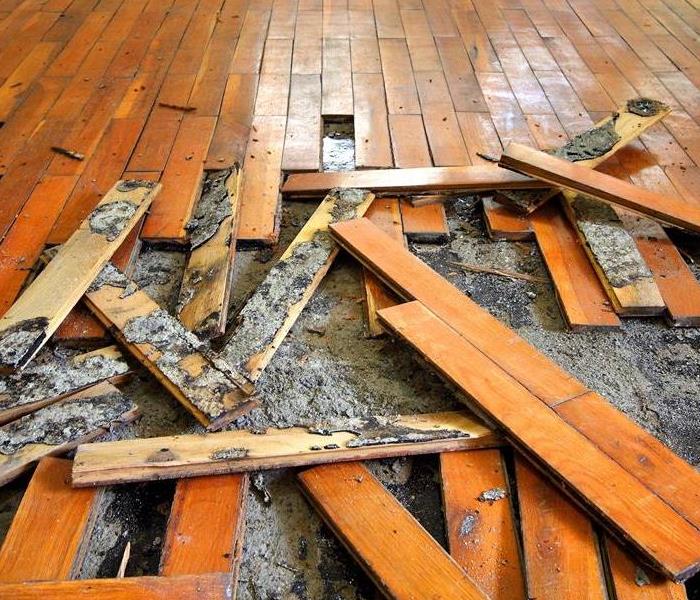 Damaged hardwood flooring.